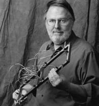 Artist with one of his LED light fixtures